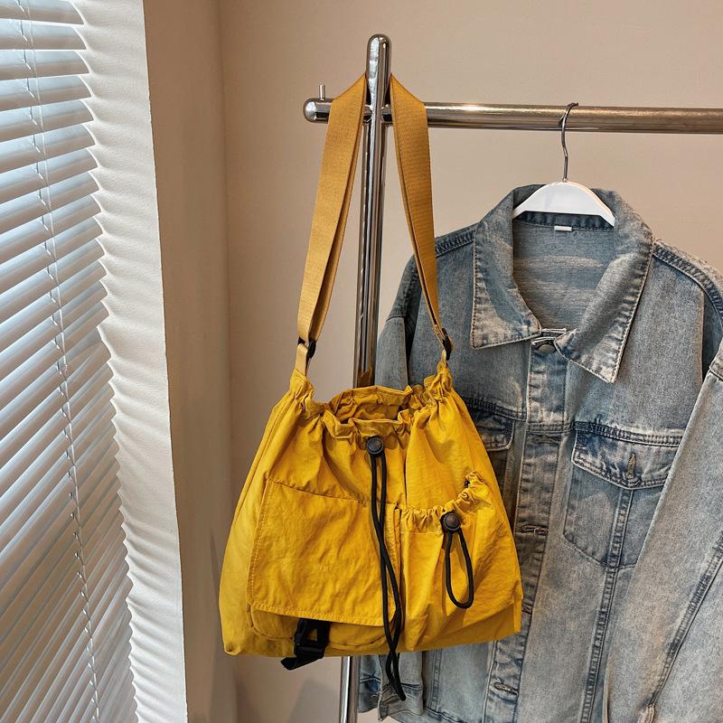 Cloth bag women's large-capacity new summer leisure niche drawstring single shoulder crossbody commuter tote bag