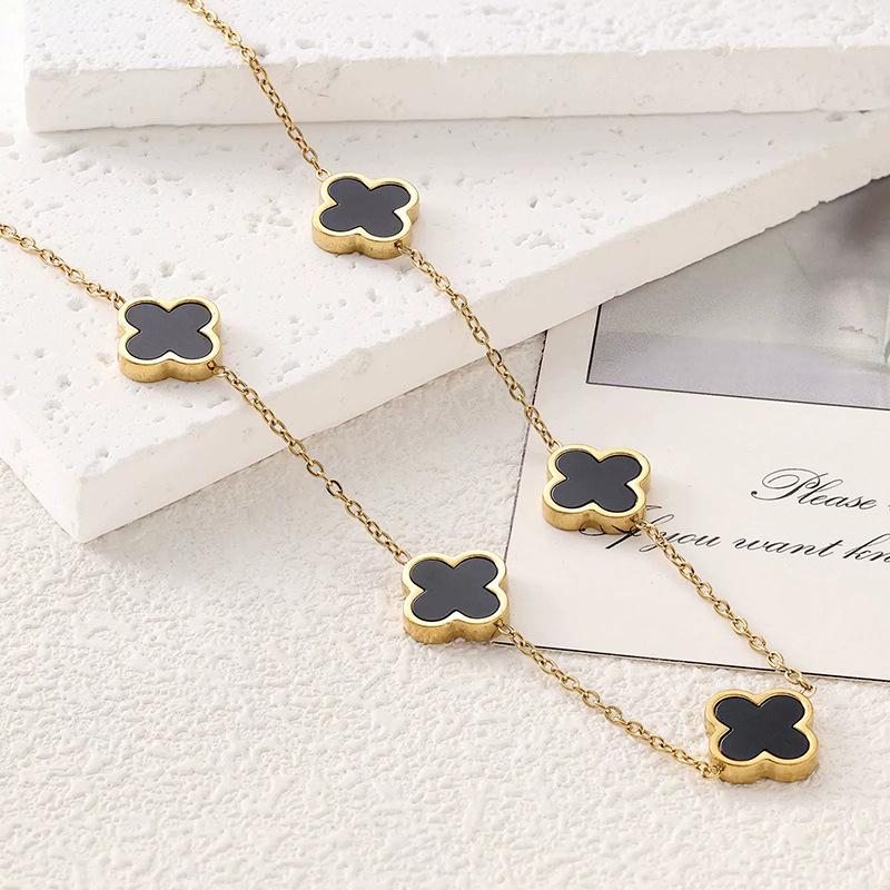 Titanium Steel Four-Leaf Clover Jewelry Set: Bracelet, Necklace & Earrings.