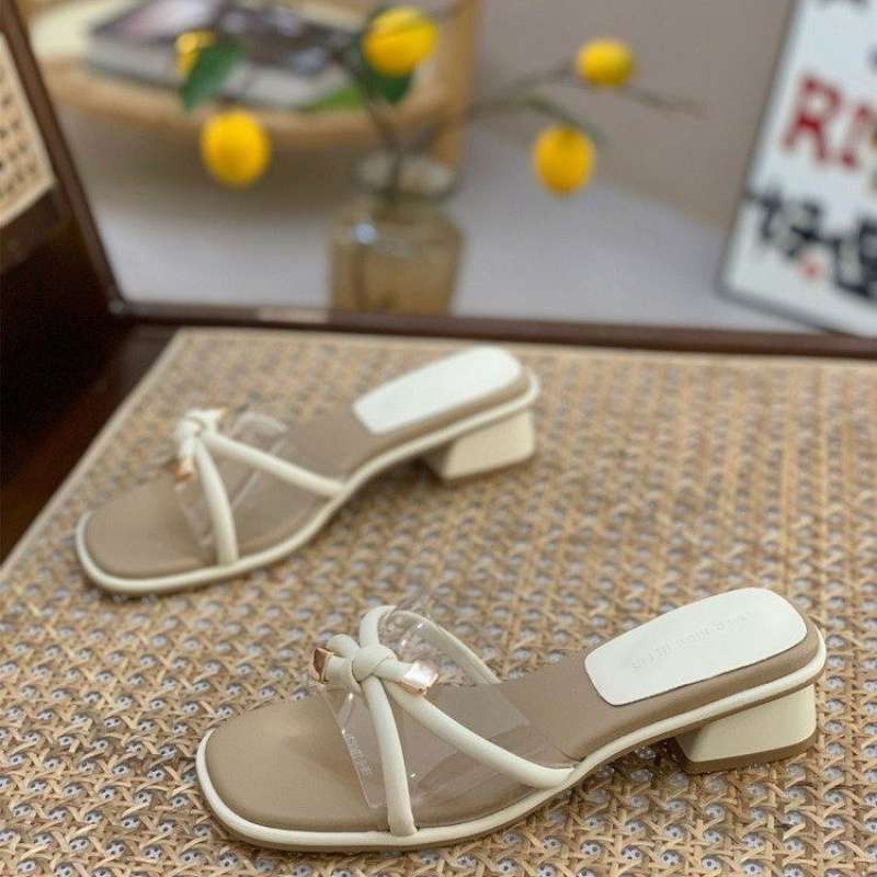 

French thick heel one-word female summer wear 2025 new versatile fairy style square head with skirt medium heel cool slippers 34