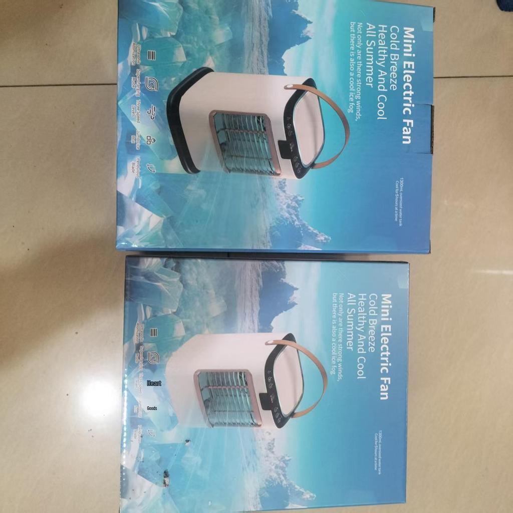 Second Generation Portable Mini Cooling & Humidifying Fan with Negative Ion Desktop Feature