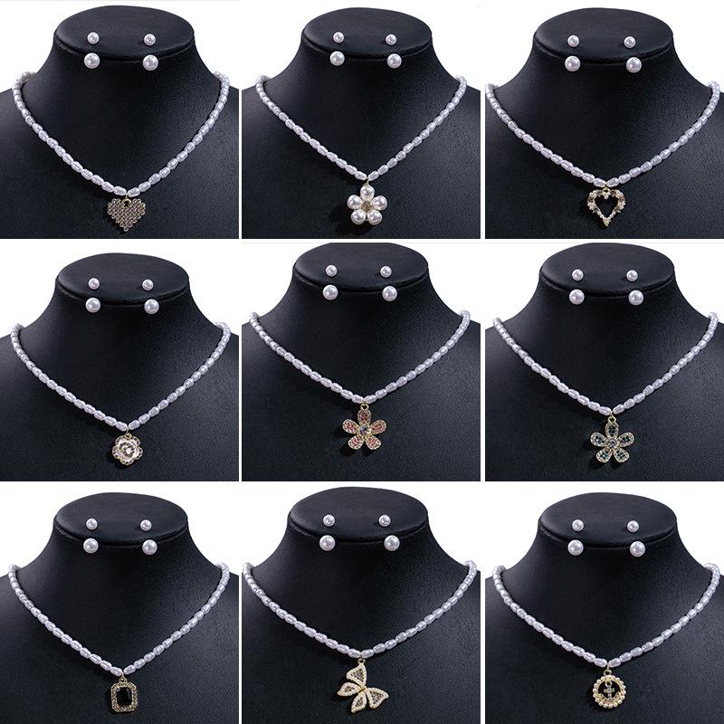 

Luxury Heart Pearl & Rhinestone Necklace Set with Geometric Design