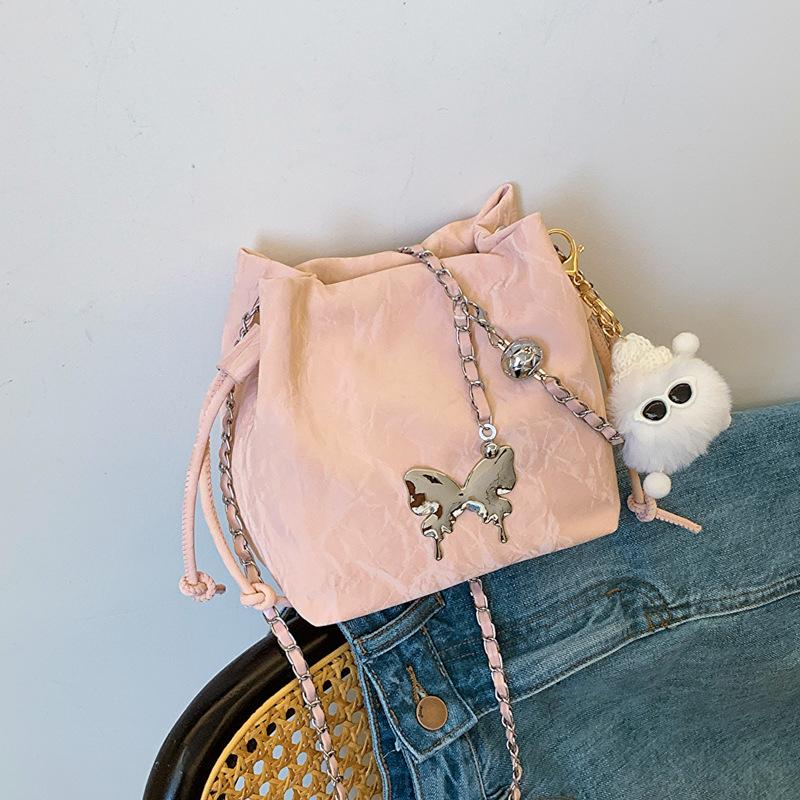 

Women s Korean version of single shoulder messenger bag is popular this year, small bag women s 2024 new summer bucket bag fashion women s bag Without pendant рожевий