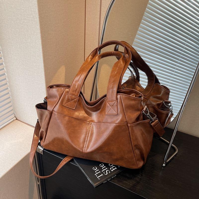 Retro large-capacity bag women's spring and summer new simple messenger bag casual and light commuter tote bag