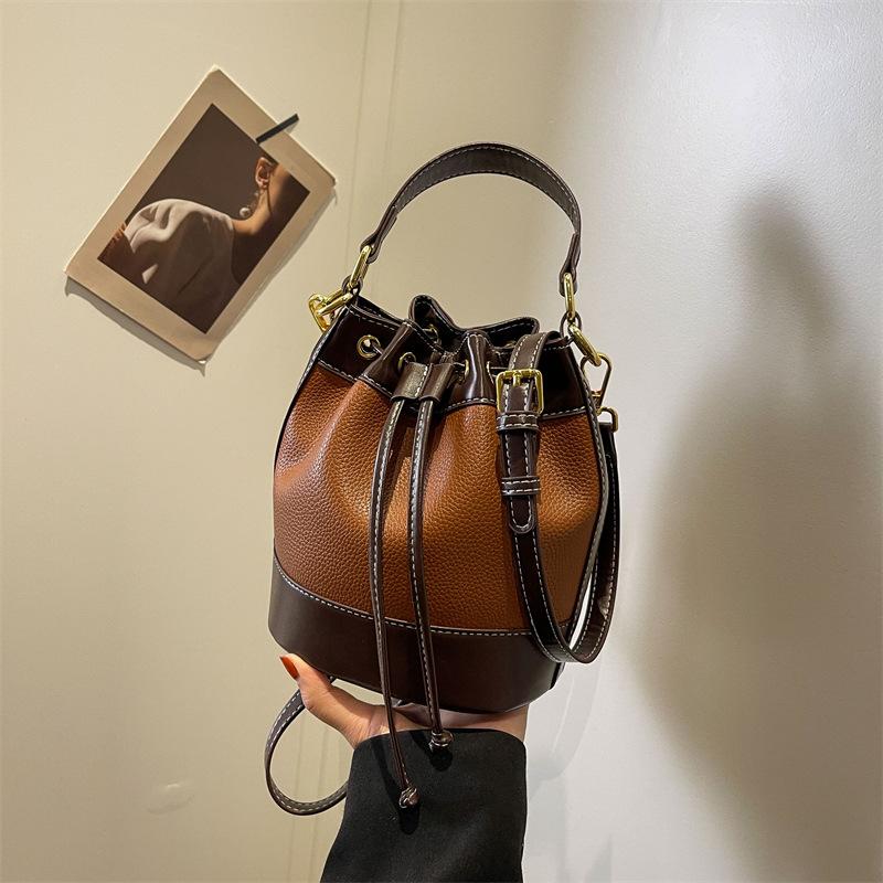 Heutige beliebte Nischen-Taschen, neue Damen-Taschen, modische vielseitige Umhängetaschen, Hand-Eimer-Taschen für Pendler