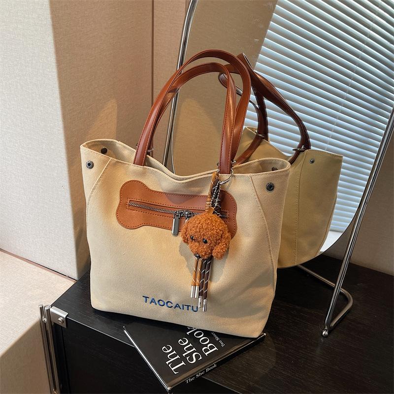 Canvas bag women's large-capacity new summer versatile shoulder tote bag multi-functional casual backpack