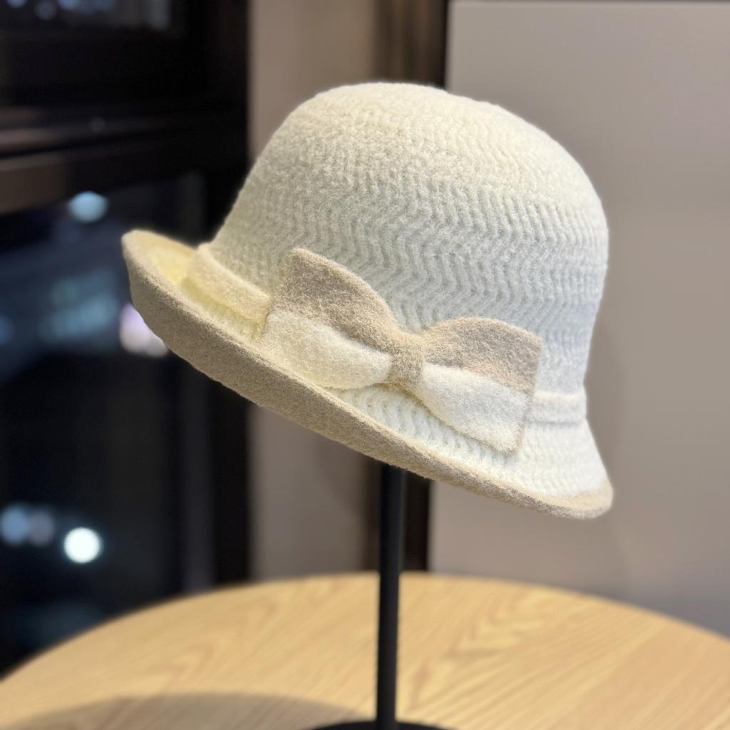 New women's autumn and winter Korean-style two-tone bow fisherman hat, elegant and warm knitted hat for middle-aged and elderly, trendy