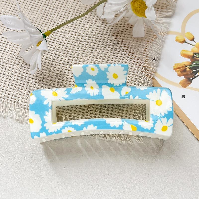 

Uv-printed Square Hair Clips with A High-end Look. The Shark Clip Is Half-tied At The Back of The Head ABS