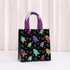 Bolsas StoBag temática navideña bolsas para envolver regalos bolsas para dulces bolsa tote de material no tejido negra colorida para empaquetar caramelos golosinas