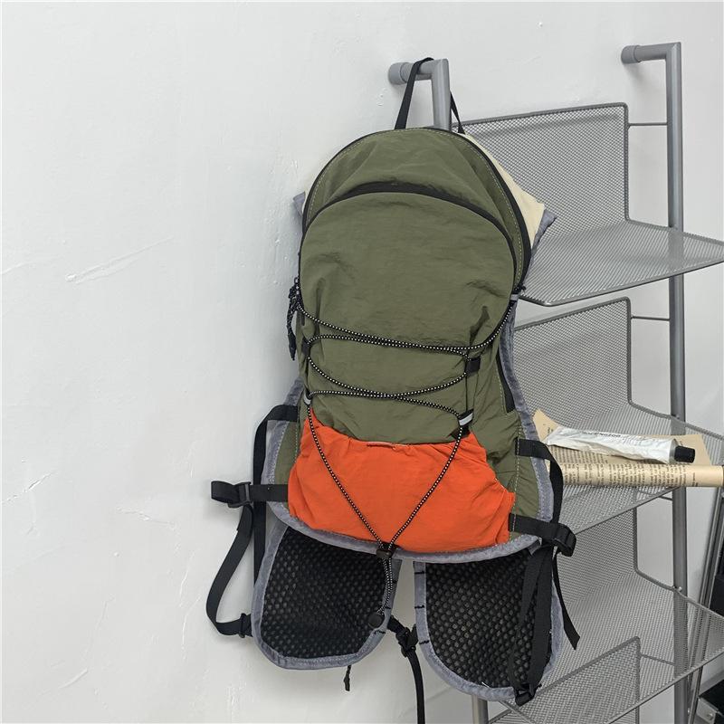 Schoolbag Functional Wind Backpack Men and Women 1011 New Lightweight Travel Backpack Lightweight Waterproof Mountaineering Bag Outdoor Socks Puppet