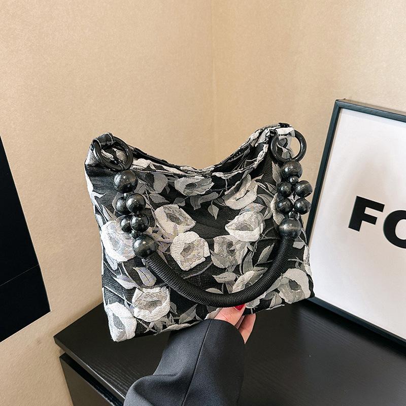 

Small bag women s 2024 summer new retro woven chain shoulder armpit bag Korean version fashion portable small square bag чорний