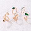Set mit 5 goldenen Ringen im Retro-Punk-Vintage-Stil mit Schlangen- und Schmetterlingsmotiven (grün)
