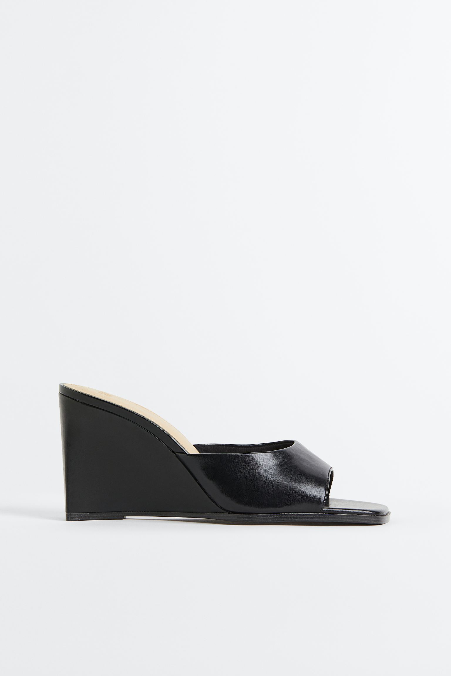 

Wedge-heeled mules