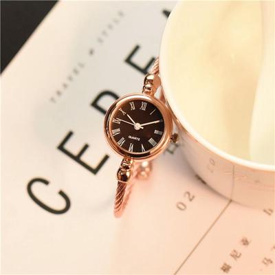 Montre-bracelet à quartz rétro à fines bretelles pour étudiantes