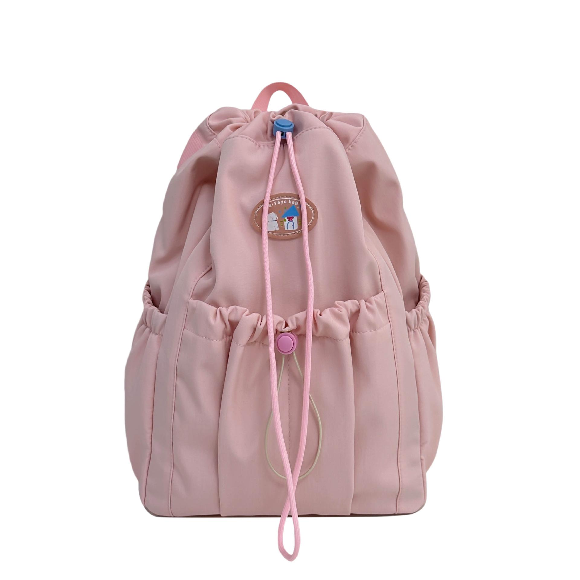 New schoolbag female junior high school high school student schoolbag versatile drawstring commuter travel backpack female large capacity розовый