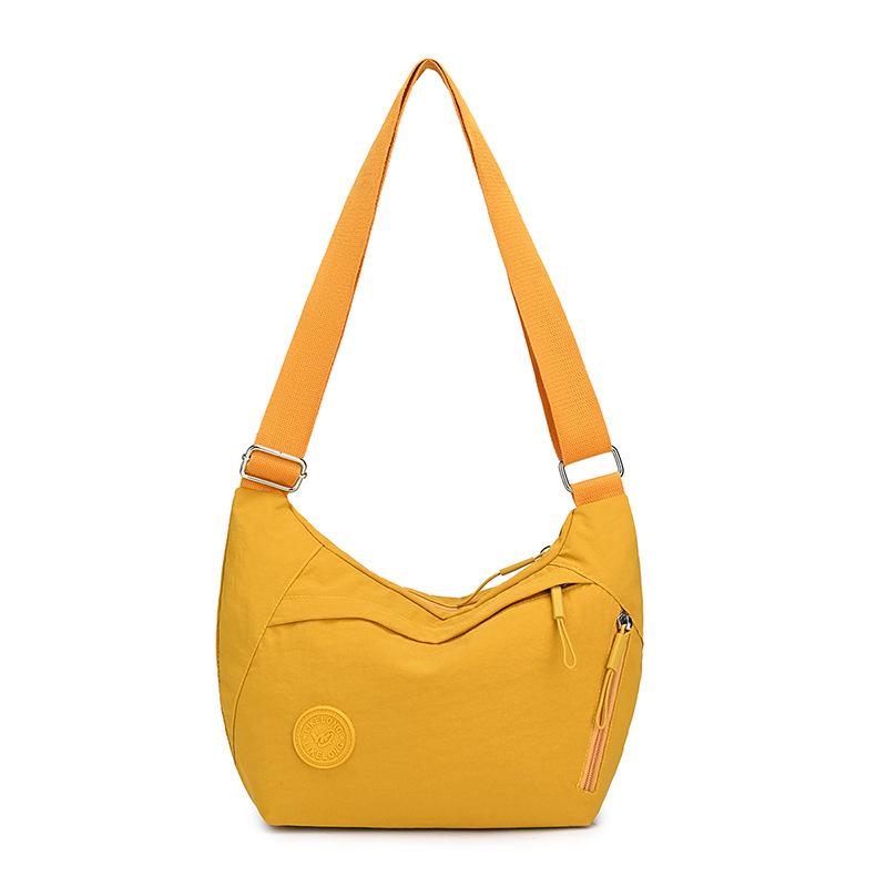 

2025 Women s Vintage Water-Repellent Canvas Crossbody Bag - Lightweight Shoulder Bag 34*6*23cm жовтий