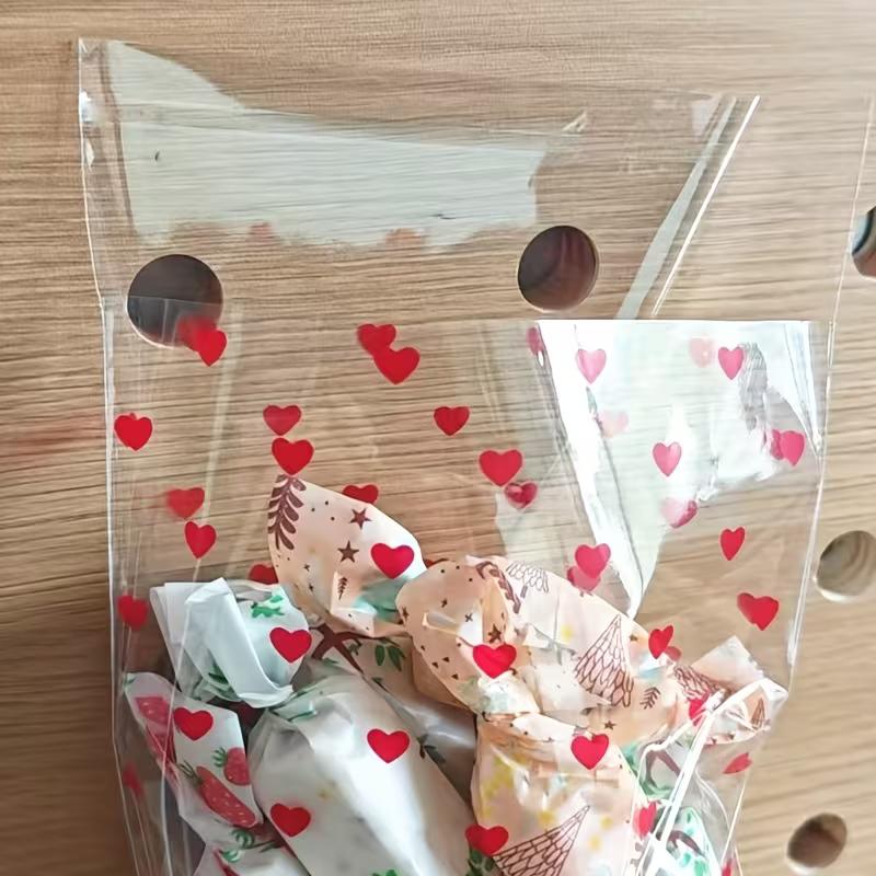 WTEMPO Valentinstag Hochzeit Geschenkbeutel Herzförmiges Muster Aufgedruckt Klare Selbstversiegelnde Beutel Tragbare Wiederverwendbare Plastiktüten Universelle Verpackungsbeutel