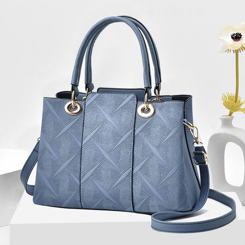 Temperament Middle-aged Women's Bag Fashion Leather Bag Large Capacity Handheld Straddle Shoulder Mother Bag Handheld Big Bag