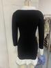 Women's Color Block Knit Sweater Skirt with Pearl Button and Ruffle