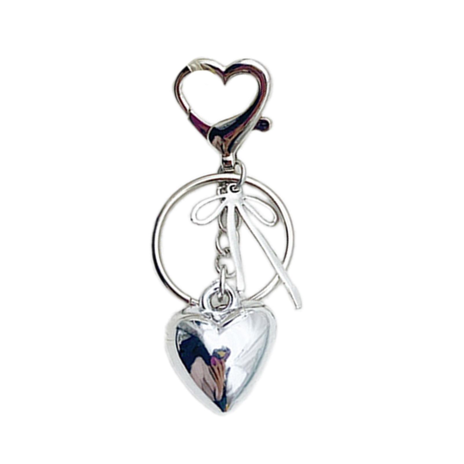 Элегантный кулон в виде сердца с бантом — фото 10