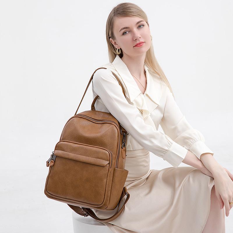 Torba na ramię z prawdziwej skóry dla kobiet. Nowy, modny plecak podróżny służbowy. Plecak komputerowy o dużej pojemności 14/15