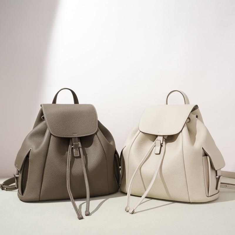 Japan and Korea Casual Drawstring Flip Backpack Women's Early Spring Niche Literary Style Commuting Portable Leather Women's Bag
