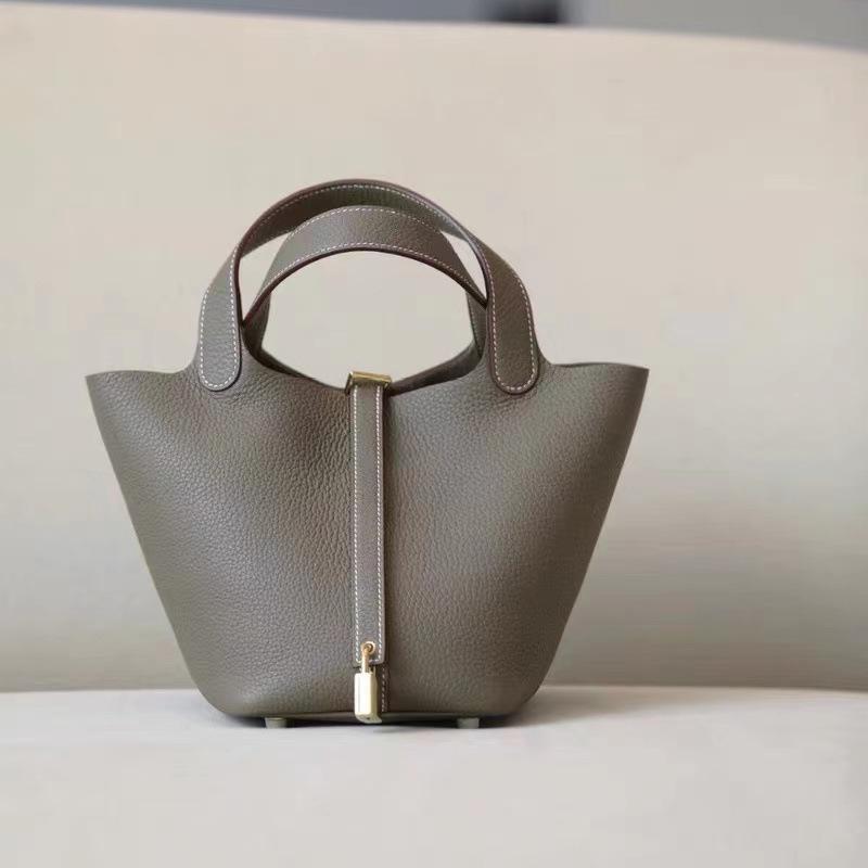 Hochwertige halbhandgefertigte Gemüsekorbtasche togo erste Schicht Rindsleder Pendlertasche echtes Leder tragbare Beuteltasche Damen 18cm