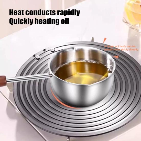 Oljetråg i rostfritt stål Dubbla hällpipar Handtag som inte blir varma Jämn värmefördelning Induktionshäll