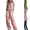 Modieuze casual damesoutfit bestaande uit een top en een broek.