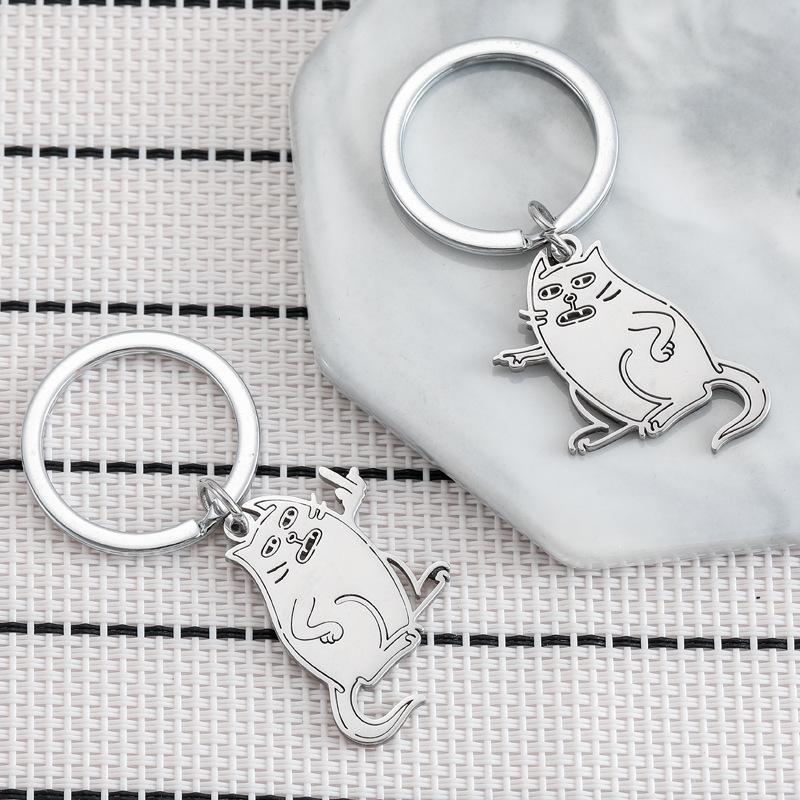 Lustige wütende Katze Edelstahl Schlüsselanhänger Humorvolles Cartoon-Design Modischer Schlüsselring Praktischer Persönlichkeits-Taschenanhänger