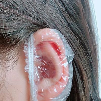 100 Stück/Los Einweg-Haar-Ohrenschützer Färben Transparent Elastisch Dusche Haarfärbe-Schutzwerkzeug Schild Wasserdicht Ohrpack Plastikfolie
