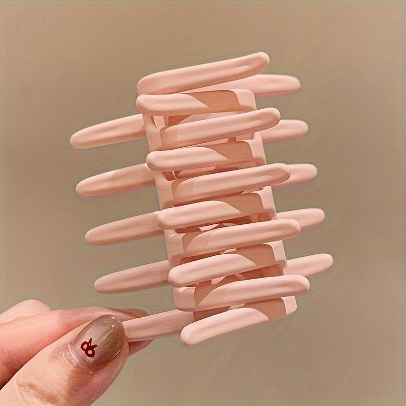 Stylish Women's Cross Ponytail Clip Medium made of durable plastic