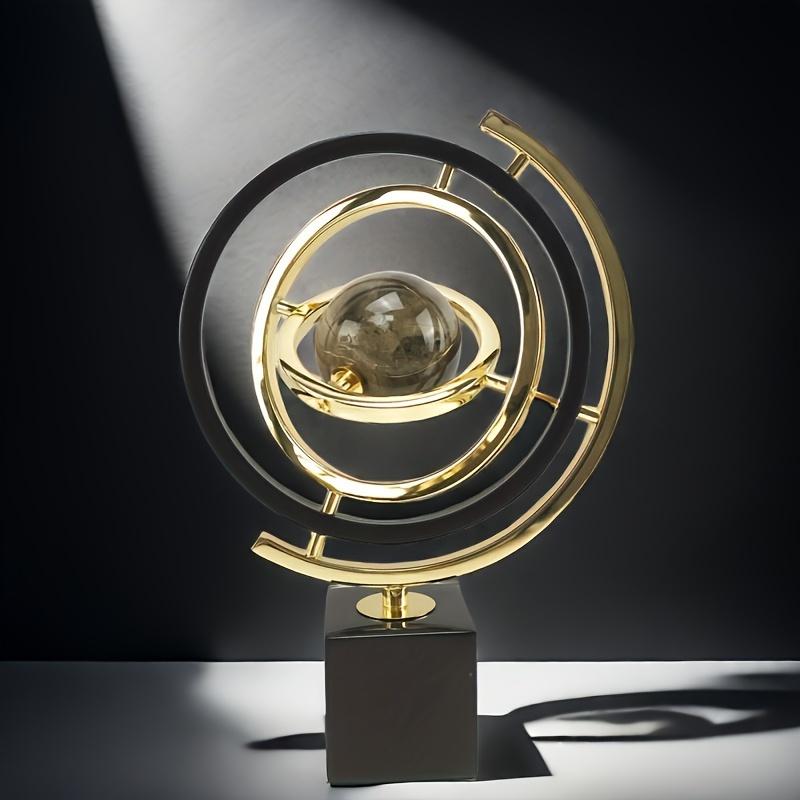 360-Degree Rotating Modern Abstract Metal Globe Sculpture with Rectangular Stand - Black & Golden Art Decor for Home or Office