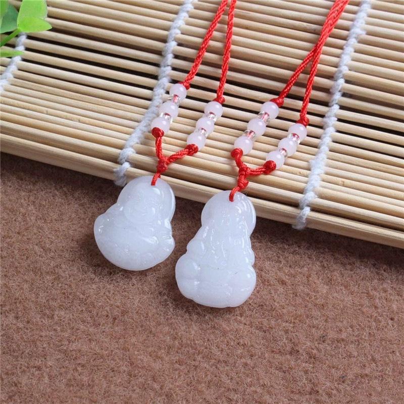 Hetian Jade Guanyin Buddha Pendant Necklace with Red String and Eight Bead Design.