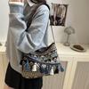 Fashion ethnic style tassel tote bag new niche shoulder bag simple holiday style versatile women's bag