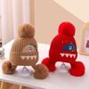 A children's dinosaur wool hat winter new cartoon jacquard knitted hat medium and older boys and girls ear hats