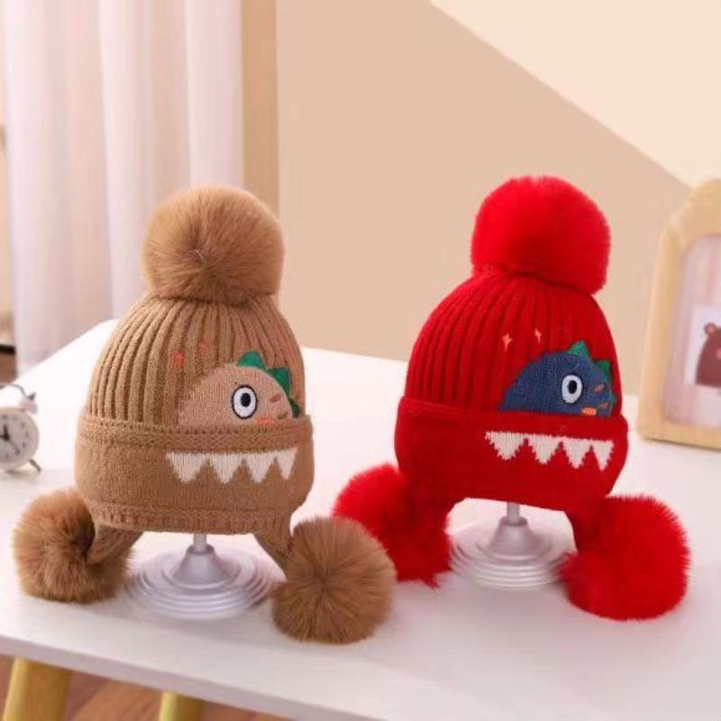A children's dinosaur wool hat winter new cartoon jacquard knitted hat medium and older boys and girls ear hats