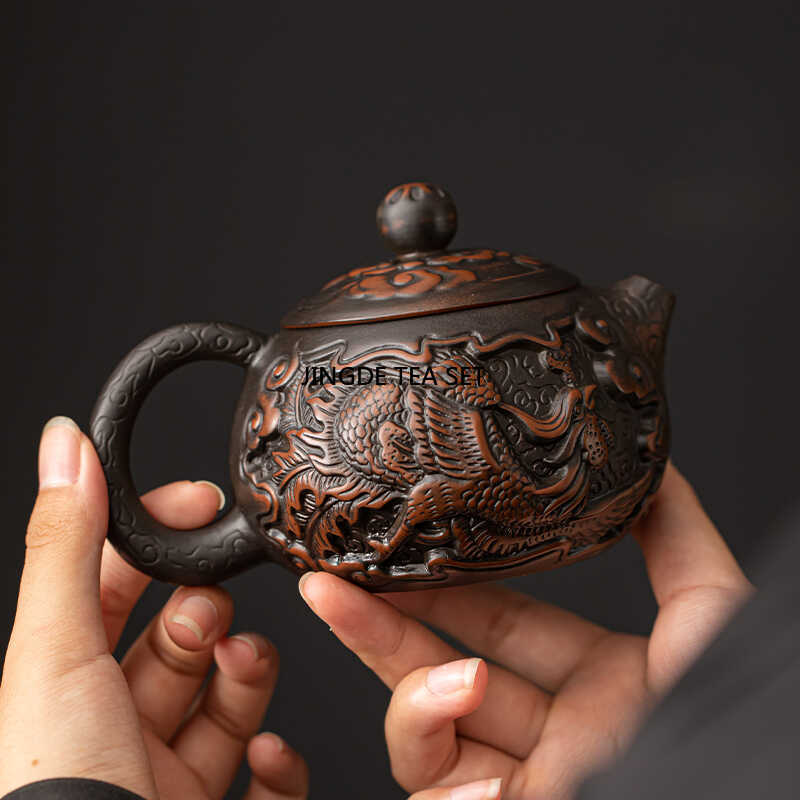 Small capacity purple pottery Xiao Long handmade antique relief teapot household kung fu tea set