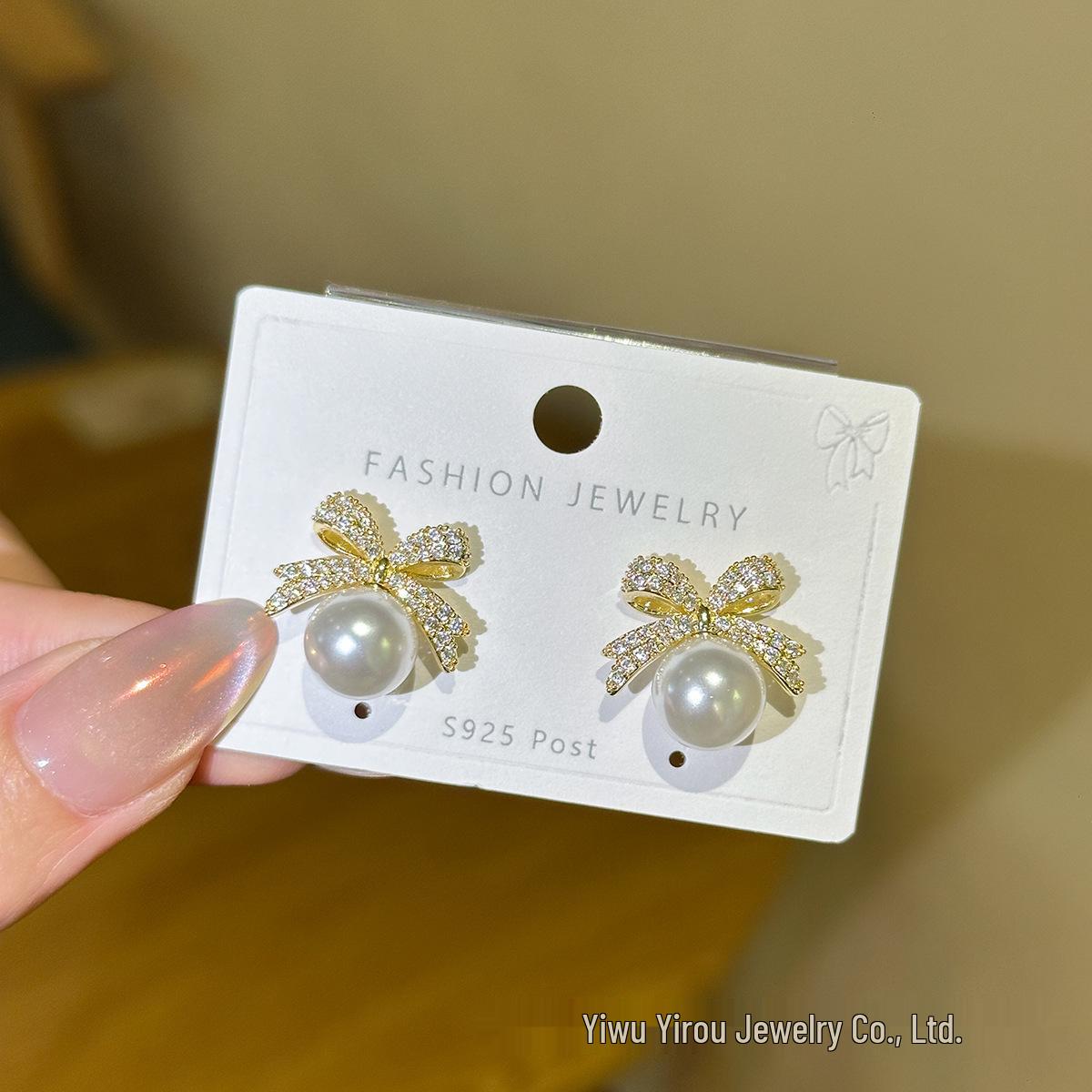 

Korean Design S925 Silver Stud Earrings with Pearl Bow and Inlaid Diamonds