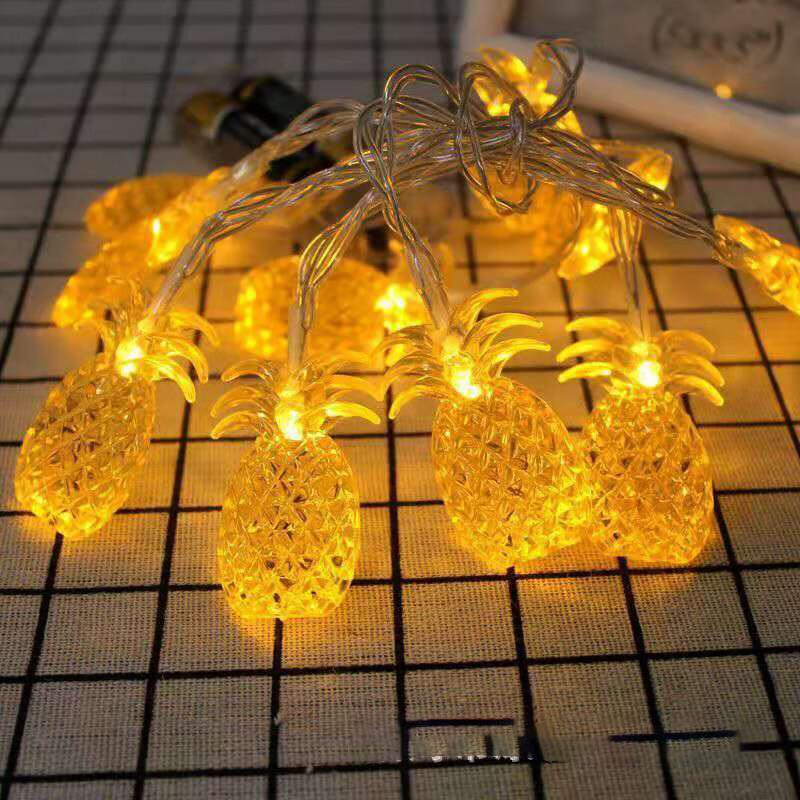 Różowo-złote LEDowe girlandy dekoracyjne z ananasami