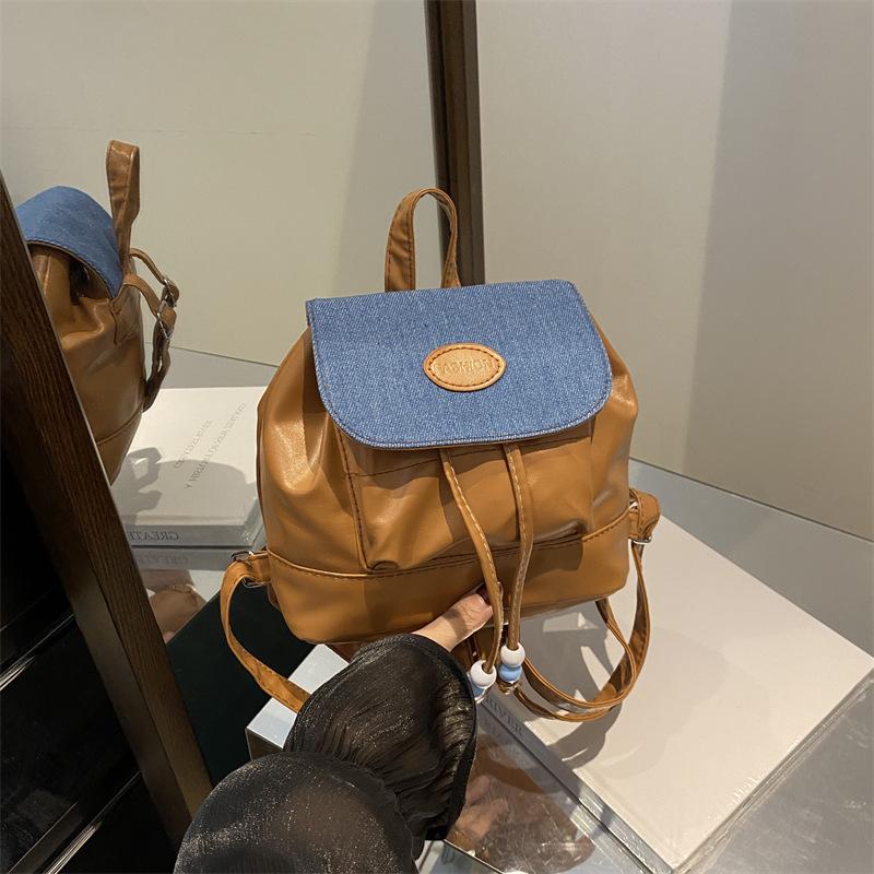2025 new retro fashion solid color backpack women's bag winter leisure tide simple travel small backpack tide