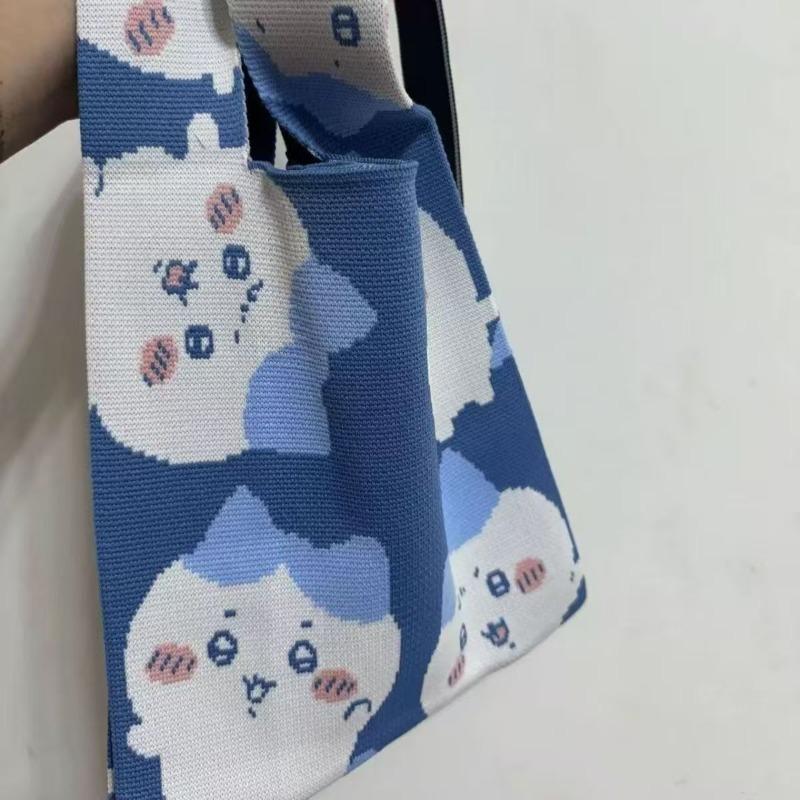 

Cartoon cute Jiyi Xiaoba high-value canvas bag messenger bag popular simple travel bag portable wrist bag