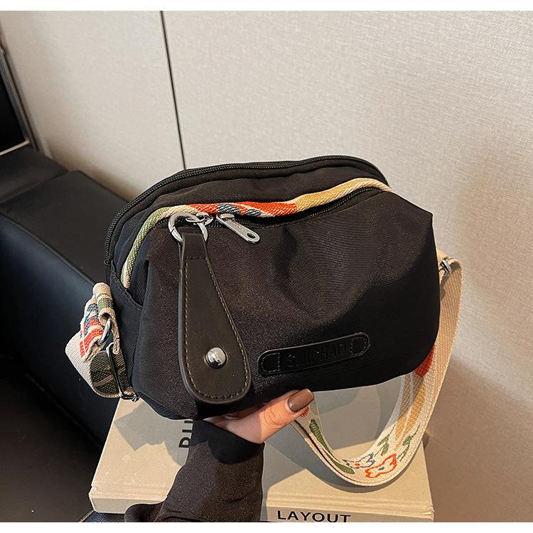 

New trendy fashion versatile shoulder bag Oxford simple and lightweight messenger bag trendy ribbon handbag 23*11*15