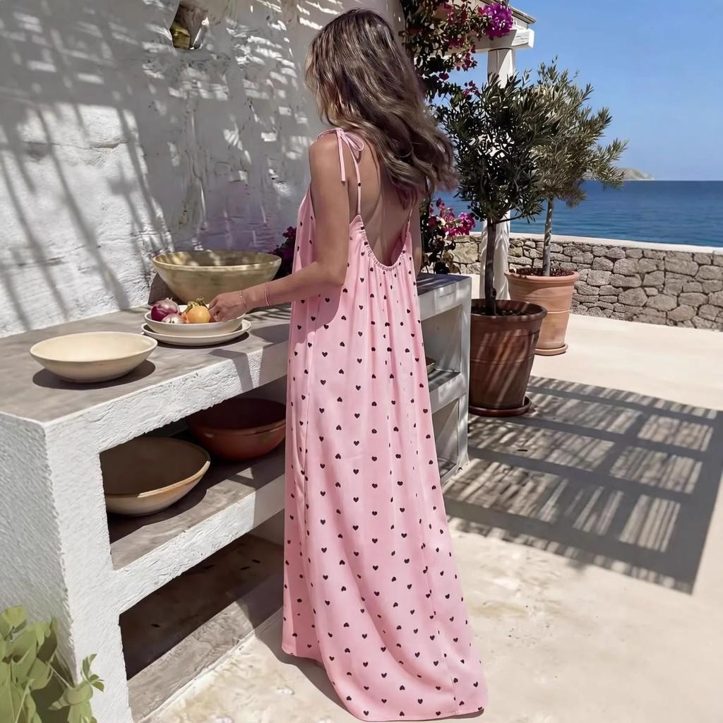 Abito estivo da donna con stampa a pois e gonna lunga svolazzante per la spiaggia e l'uso casual