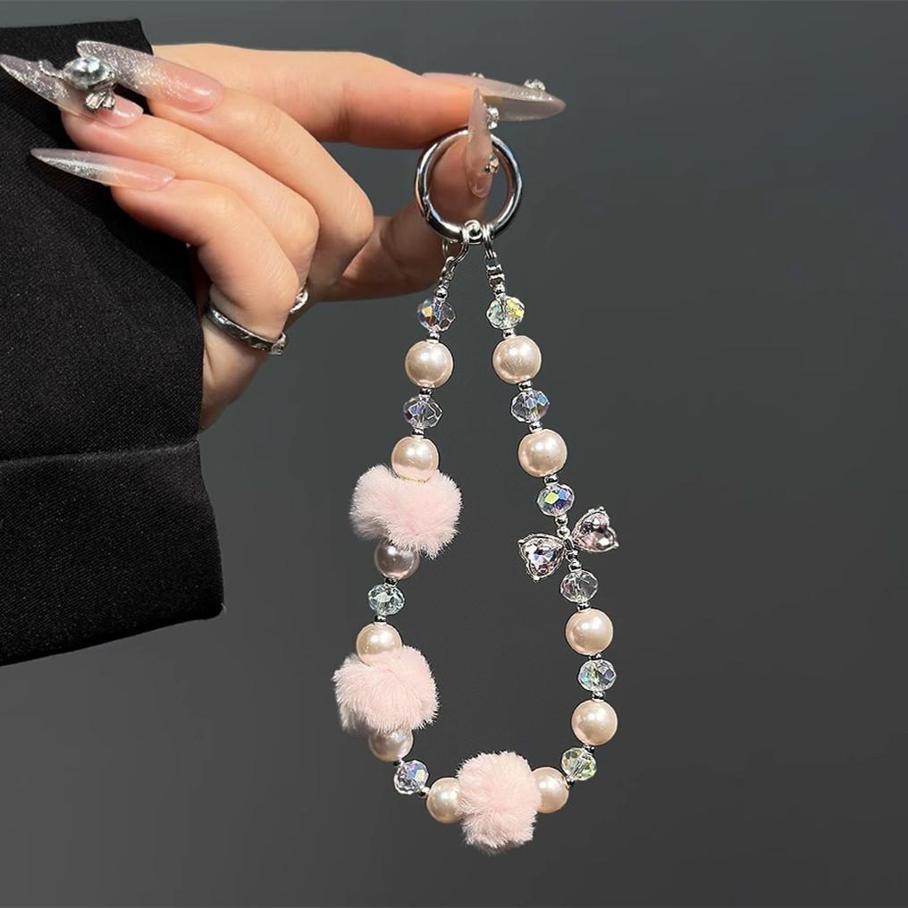 New high-end autumn and winter pom-pom mobile phone chain beaded short lanyard bag keychain pendant girl pendant