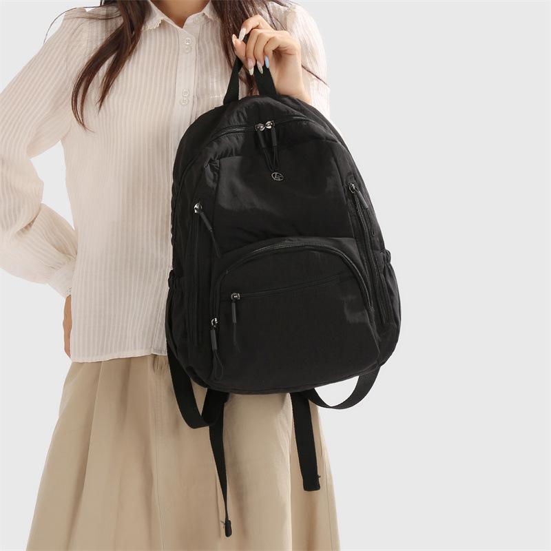 Schultasche Einfarbige Einfache Leichte Schultasche Rucksack für College-Studentinnen Tragbar Reise Wasserdicht Frühling High-School-Rucksack Männlich Lässig