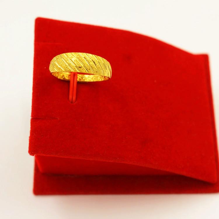 

Регулируемое золотое кольцо-бабочка с рисунком в виде звезды и цветка