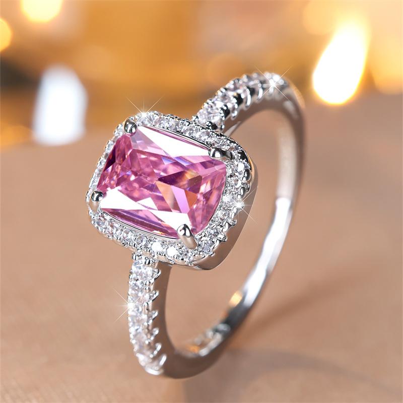 Anillo de compromiso de lujo con piedra rosa de corte rectangular