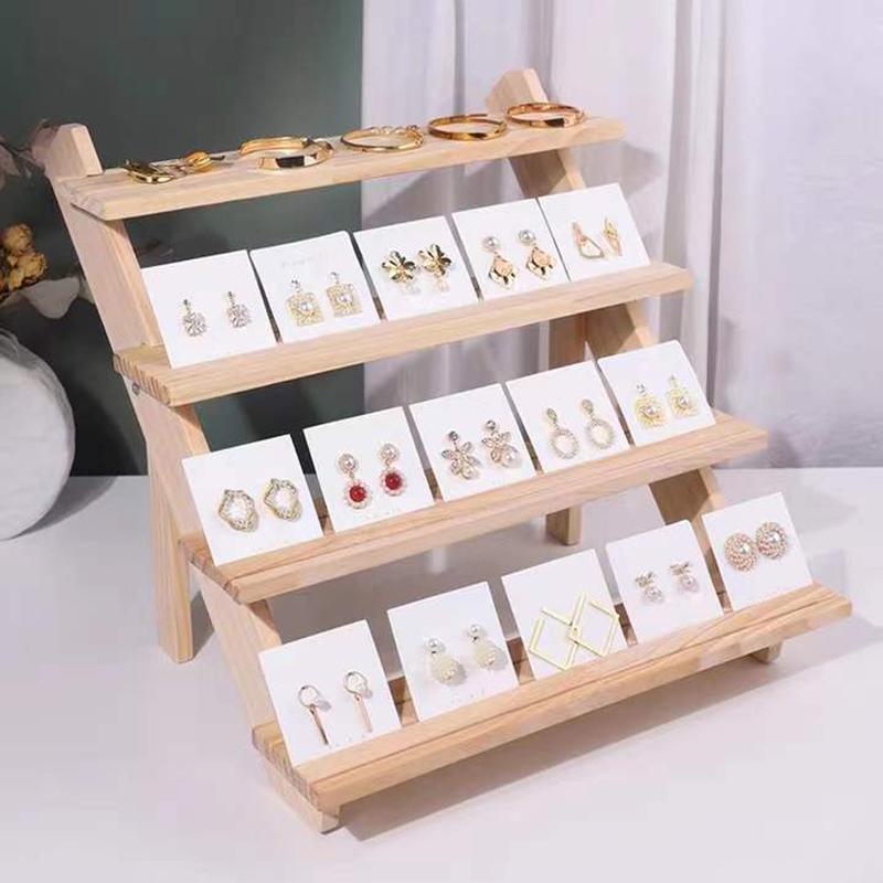 Flerlags utstillingsstativ Loggring Øredobbknapp Utstillingsstativ Avtakbart Øredobbkort Smykkestativ Dukkehånd Visning