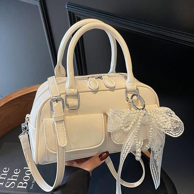 Koreanische Version der beliebten Dopamin-einfachen, tragbaren Boston-Tasche für Frühling und Sommer, Nischen-Casual-Auslandsstil, Pendler-Umhängetasche, Damentasche