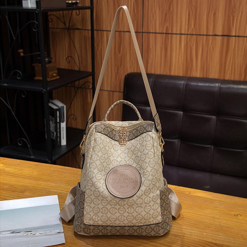 Nový slavný dámský batoh s retro potiskem Batoh Velkokapacitní Cestovní batoh Splash Vysoce kvalitní školní taška přes rameno z PU kůže